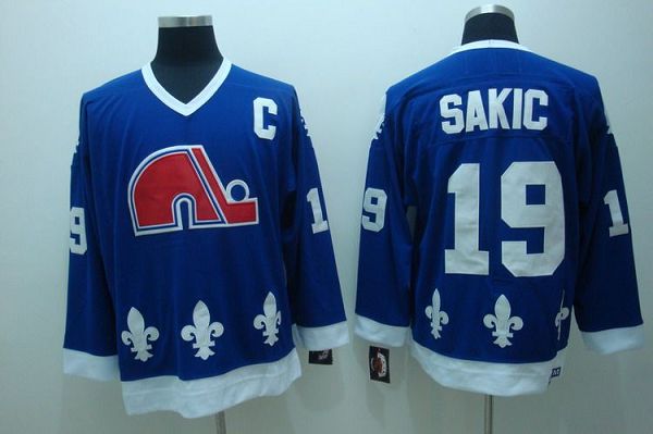 Nordiques #19 Joe Sakic Stitched CCM Throwback Blue NHL Jersey